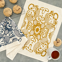 Load image into Gallery viewer, Tea Towel Cotton Paradise in Pearl Gold and Denim 16 in x 22 in